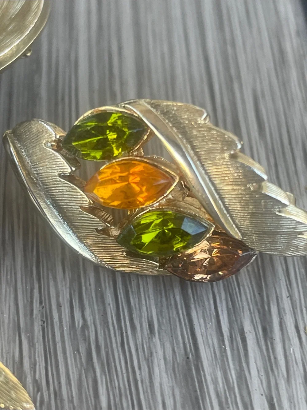 JJ Gold-Tone Leaf Brooch and Earring Set with Olive Green & Amber Stones